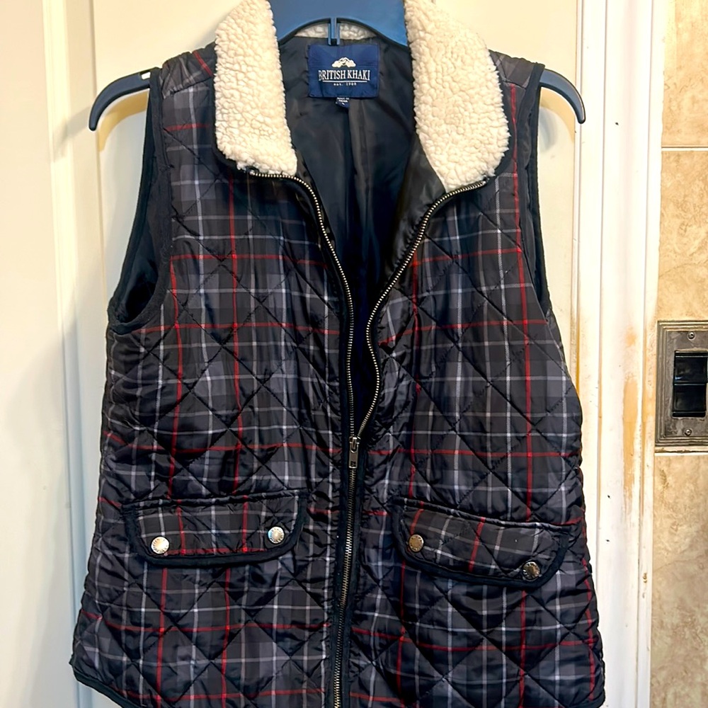 Size large women’s brown flannel print vest.